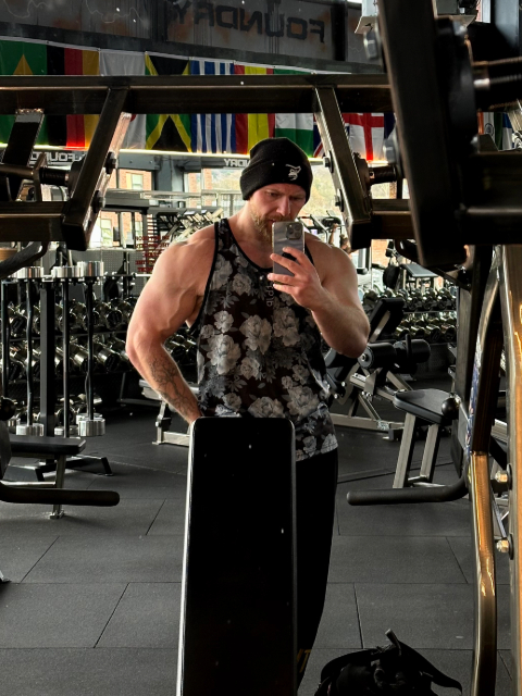 Personal trainer Rocky in Sheffield gym performing strength coaching session